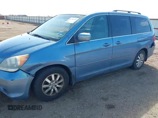 2010 Honda Odyssey EX-L with VIN 5FNRL3H7XAB052742, listed as a IAAI auction lot 41705935 with 205,190 mi miles and . Bid and sale history available at DreamBid. Image 6.