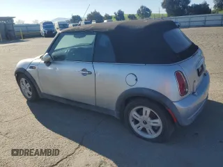 2005 MINI Convertible with VIN WMWRF33465TG10044, listed as a Copart auction lot 50364235 with 152,186 mi miles and Salvage title. Bid and sale history available at DreamBid. Image 2.