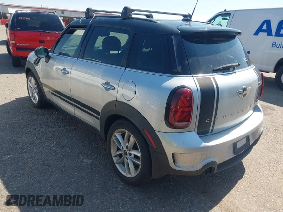 2014 MINI Countryman S with VIN WMWZC5C52EWP36667, listed as a IAAI auction lot 42541120 with 149,331 mi miles and . Bid and sale history available at DreamBid. Image 3.