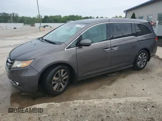 2015 Honda Odyssey Touring Elite with VIN 5FNRL5H95FB117985, listed as a Copart auction lot 57178695 with 199,757 mi miles and Non repairable. Bid and sale history available at DreamBid. Image 1.