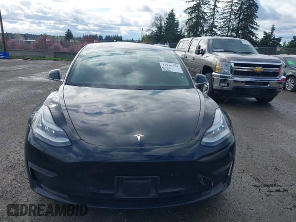2019 Tesla Model 3 Mid Range with VIN 5YJ3E1EA4KF305611, listed as a IAAI auction lot 41916738 with 59,101 mi miles and . Bid and sale history available at carsss.com. Image 12.
