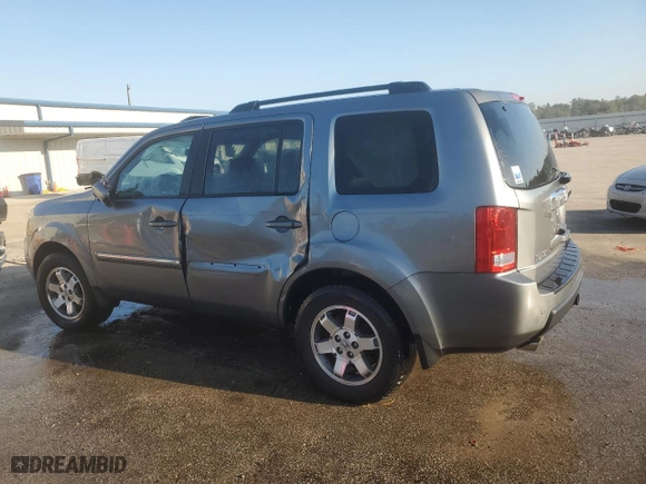 2009 Honda Pilot Touring with VIN 5FNYF388X9B012023, listed as a Copart auction lot 74843174 with 221,210 mi miles and Salvage Title. Bid and sale history available at carsss.com. Image 2.