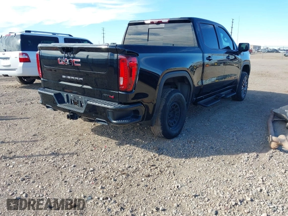 2021 GMC Sierra 1500 AT4 with VIN 1GTU9EETXMZ230606, listed as a IAAI auction lot 41599778 with 128,745 mi miles. Bid and sale history available at carsss.com. Image 4.