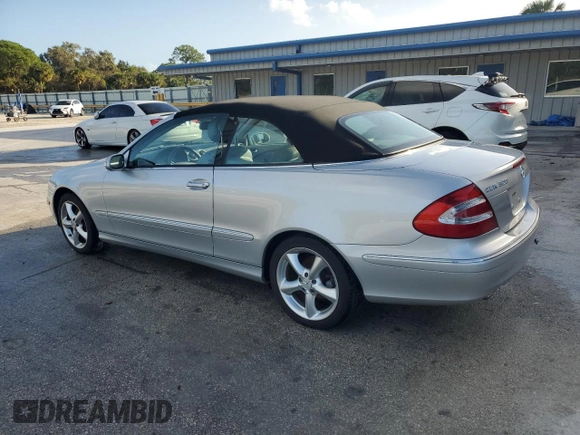 2005 Mercedes-Benz CLK-Class 3.2L with VIN WDBTK65J45F134556, listed as a Copart auction lot 74143204 with 61,131 mi miles and Salvage Title. Bid and sale history available at carsss.com. Image 2.