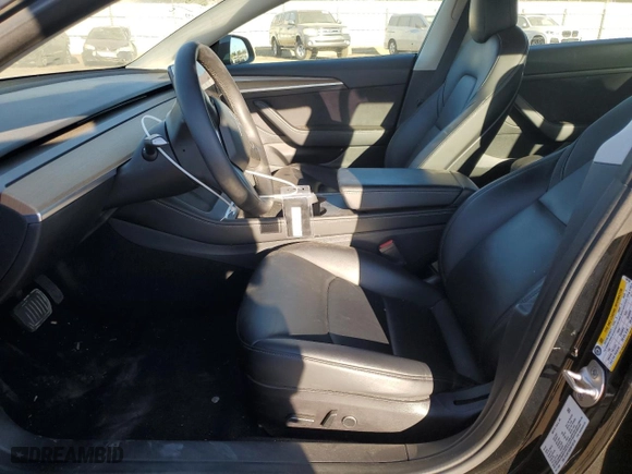 2022 Tesla Model 3 Long Range with VIN 5YJ3E1EB6NF198106, listed as a Copart auction lot 76122144 with 58,072 mi miles and Salvage Title. Bid and sale history available at carsss.com. Image 7.