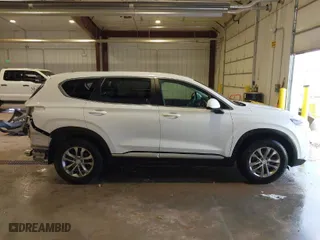2019 Hyundai Santa Fe SE with VIN 5NMS2CAD4KH120957, listed as a IAAI auction lot 41937085 with 101,584 mi miles. Bid and sale history available at carsss.com. Image 14.