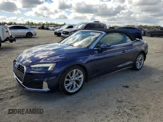 2021 Audi A5 Cabriolet Premium Plus z VIN WAUWAGF59MN001219, wystawiony jako Copart lot #76755213 z przebiegiem 15 620 mil mil oraz . Historia ofert i sprzedaży dostępna na DreamBid. Obrazek 1.
