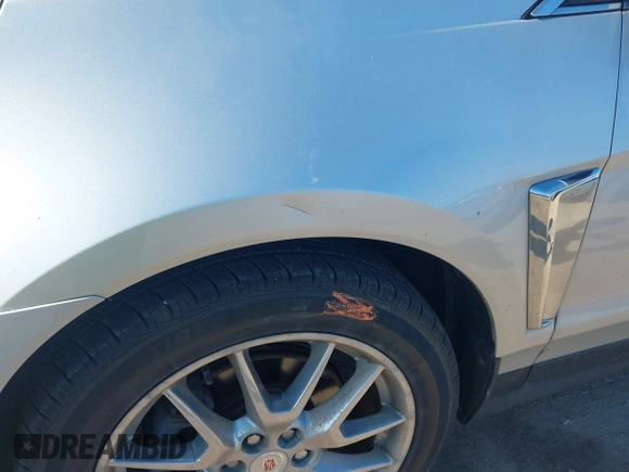 2013 Cadillac SRX Performance Collection z VIN 3GYFNHE33DS540108, wystawiony jako IAAI lot #42061957 z przebiegiem 182 797 mil mil oraz . Historia ofert i sprzedaży dostępna na DreamBid. Obrazek 17.