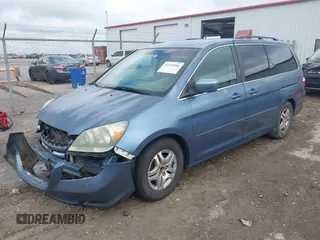 2007 Honda Odyssey EX with VIN 5FNRL384X7B063481, listed as a IAAI auction lot 42352096 with 106,047 mi miles and . Bid and sale history available at DreamBid. Image 2.