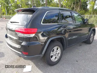 2017 Jeep Grand Cherokee Laredo with VIN 1C4RJEAG5HC663930, listed as a IAAI auction lot 41684918 with 91,063 mi miles. Bid and sale history available at carsss.com. Image 4.