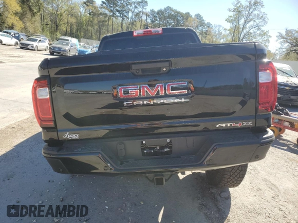 2024 GMC Canyon 4WD AT4X with VIN 1GTP6EEK7R1133432, listed as a Copart auction lot 49871295 with Not Provided miles and Salvage Title. Bid and sale history available at carsss.com. Image 6.