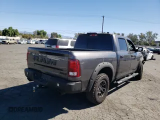2018 Ram 1500 Rebel with VIN 1C6RR7YT1JS161619, listed as a Copart auction lot 60226061 with 49,567 mi miles and Salvage Title. Bid and sale history available at carsss.com. Image 4.