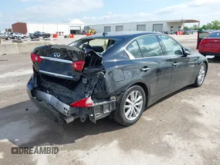 2015 Infiniti Q50 Premium with VIN JN1BV7AP6FM352678, listed as a IAAI auction lot 42197537 with 192,761 mi miles and . Bid and sale history available at DreamBid. Image 4.