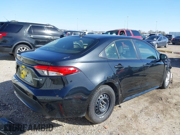 2021 Toyota Corolla Hybrid LE with VIN JTDEAMDE8MJ034218, listed as a IAAI auction lot 41692711 with 65,651 mi miles. Bid and sale history available at carsss.com. Image 4.