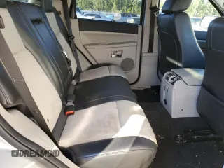2010 Jeep Grand Cherokee Limited z VIN 1J4RR5GT4AC145692, wystawiony jako Copart lot #75649614 z przebiegiem 99 362 mil mil oraz Szkoda całkowita • Salvage title. Historia ofert i sprzedaży dostępna na DreamBid. Obrazek 11.