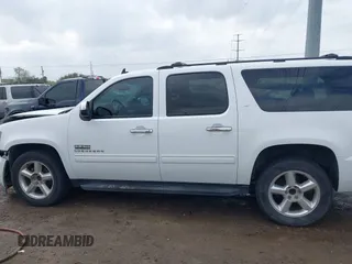 2014 Chevrolet Suburban LT with VIN 1GNSCJE04ER107836, listed as a IAAI auction lot 41698679 with 106,139 mi miles. Bid and sale history available at carsss.com. Image 14.