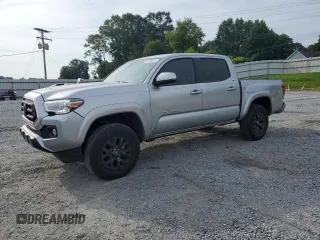 2023 Toyota Tacoma SR with VIN 3TYCZ5AN2PT111669, listed as a Copart auction lot 59188665 with 30,721 mi miles and Salvage title. Bid and sale history available at DreamBid. Image 1.