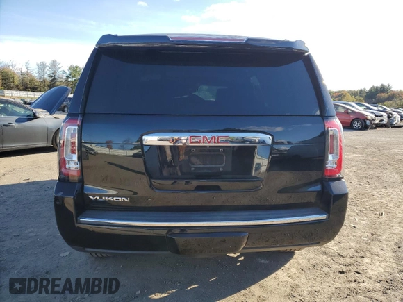 2016 GMC Yukon Denali with VIN 1GKS1CKJXGR329103, listed as a Copart auction lot 75492494 with 124,374 mi miles and Salvage Title. Bid and sale history available at carsss.com. Image 6.