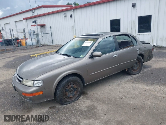 1999 Nissan Maxima GXE z VIN JN1CA21D5XT203484, wystawiony jako IAAI lot #42161696 z przebiegiem 249 747 mil mil oraz . Historia ofert i sprzedaży dostępna na DreamBid. Obrazek 2.