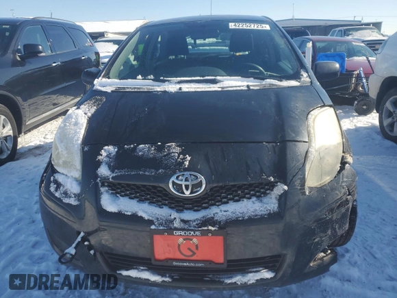 2011 Toyota Yaris with VIN JTDJT4K39B5336620, listed as a Copart auction lot 42252725 with 84,623 mi miles and Salvage Title. Bid and sale history available at carsss.com. Image 5.