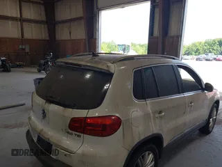 2012 Volkswagen Tiguan SE with VIN WVGAV7AXXCW533237, listed as a IAAI auction lot 42670923 with 227,323 mi miles and . Bid and sale history available at DreamBid. Image 13.