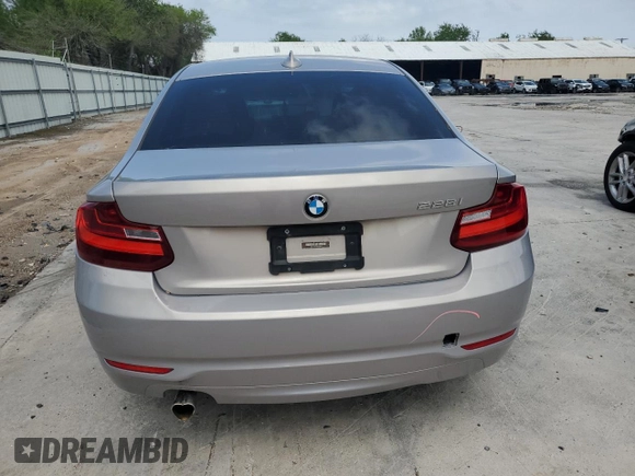 2015 BMW 2 Series 228i with VIN WBA1F5C51FV257605, listed as a Copart auction lot 50991415 with 122,396 mi miles and Salvage Title. Bid and sale history available at carsss.com. Image 6.