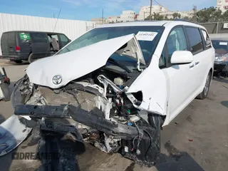 2014 Toyota Sienna SE with VIN 5TDXK3DC2ES472249, listed as a IAAI auction lot 41402101 with Not Provided miles and . Bid and sale history available at DreamBid. Image 6.