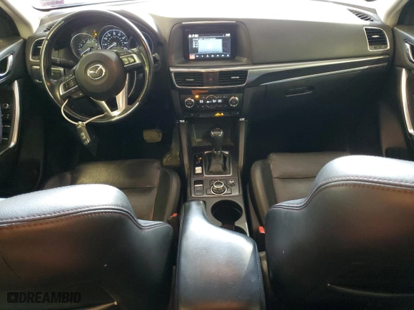 2016 Mazda CX-5 Grand Touring with VIN JM3KE4DY5G0888828, listed as a Copart auction lot 48558365 with 171,021 mi miles and Salvage Title. Bid and sale history available at carsss.com. Image 8.