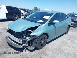 2016 Toyota Prius Four z VIN JTDKARFU0G3016597, wystawiony jako IAAI lot #42034214 z przebiegiem 125 799 mil mil oraz . Historia ofert i sprzedaży dostępna na DreamBid. Obrazek 17.