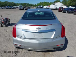 2014 Cadillac CTS Luxury AWD with VIN 1G6AX5S34E0124464, listed as a IAAI auction lot 42298607 with 89,351 mi miles and . Bid and sale history available at DreamBid. Image 16.