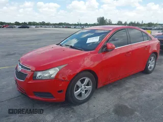 2014 Chevrolet Cruze 1LT with VIN 1G1PC5SB5E7363631, listed as a IAAI auction lot 42169788 with 101,939 mi miles and . Bid and sale history available at DreamBid. Image 2.