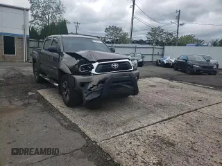 2013 Toyota Tacoma z VIN 3TMLU4EN4DM124465, wystawiony jako Copart lot #58167135 z przebiegiem 116 098 mil mil oraz Szkoda całkowita • Salvage title. Historia ofert i sprzedaży dostępna na DreamBid. Obrazek 13.