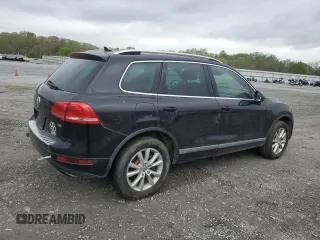 2014 Volkswagen Touareg Lux with VIN WVGEF9BP5ED005175, listed as a Copart auction lot 51815565 with 163,183 mi miles and Clean Title. Bid and sale history available at DreamBid. Image 3.
