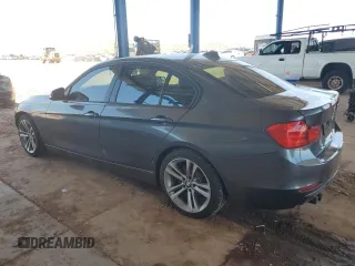 2012 BMW 3 Series 328i with VIN WBA3A5C5XCF340494, listed as a Copart auction lot 61669965 with 70,838 mi miles and Salvage title. Bid and sale history available at DreamBid. Image 2.