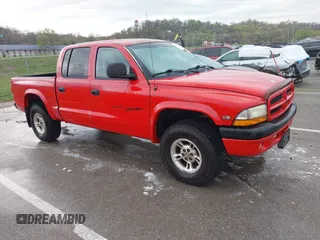 2000 Dodge Dakota Sport with VIN 1B7GG2ANXYS621732, listed as a IAAI auction lot 41930673 with 145,653 mi miles and . Bid and sale history available at carsss.com. Image 1.
