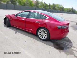 2018 Tesla Model S 75D with VIN 5YJSA1E29JF273494, listed as a IAAI auction lot 42246104 with 93,870 mi miles and . Bid and sale history available at DreamBid. Image 3.