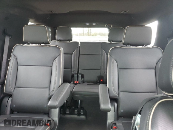 2023 Chevrolet Tahoe Premier with VIN 1GNSKSKD0PR217513, listed as a Copart auction lot 54702845 with 55,424 mi miles and Salvage title. Bid and sale history available at DreamBid. Image 10.