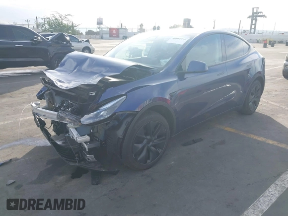 2025 Tesla Model Y Long Range with VIN 7SAYGDED2SF219423, listed as a IAAI auction lot 40984912 with 728 mi miles and . Bid and sale history available at DreamBid. Image 2.