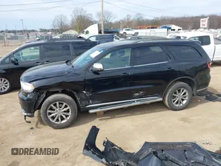 2018 Dodge Durango SXT with VIN 1C4RDJAG4JC434807, listed as a IAAI auction lot 41893271 with 94,447 mi miles and . Bid and sale history available at DreamBid. Image 14.