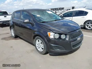 2014 Chevrolet Sonic LT with VIN 1G1JC6SHXE4135948, listed as a IAAI auction lot 41949833 with 127,202 mi miles. Bid and sale history available at carsss.com. Image 1.