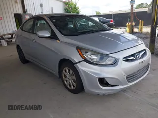 2013 Hyundai Accent GLS z VIN KMHCT4AE9DU476392, wystawiony jako IAAI lot #42504085 z przebiegiem 187 713 mil mil oraz . Historia ofert i sprzedaży dostępna na DreamBid. Obrazek 1.