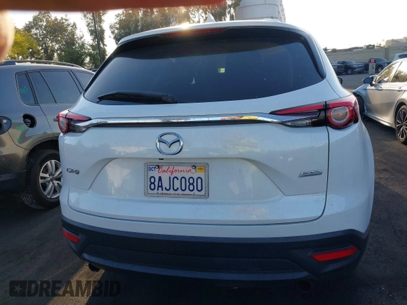 2018 Mazda CX-9 Sport with VIN JM3TCABY8J0204499, listed as a IAAI auction lot 42374933 with 114,408 mi miles and . Bid and sale history available at DreamBid. Image 16.