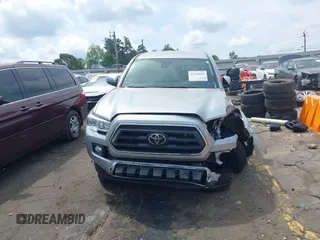 2023 Toyota Tacoma SR with VIN 3TYCZ5AN2PT176554, listed as a IAAI auction lot 42148651 with 15,255 mi miles and . Bid and sale history available at DreamBid. Image 12.