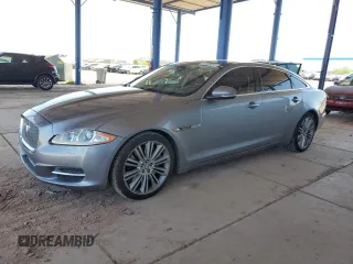 2012 Jaguar XJ Supercharged with VIN SAJWA2GE4CMV27817, listed as a Copart auction lot 54606585 with 155,690 mi miles and Salvage title. Bid and sale history available at DreamBid. Image 1.