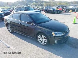2013 Volkswagen Jetta GLI with VIN 3VW4S7AJ2DM300120, listed as a IAAI auction lot 42002950 with 106,304 mi miles and . Bid and sale history available at DreamBid. Image 1.