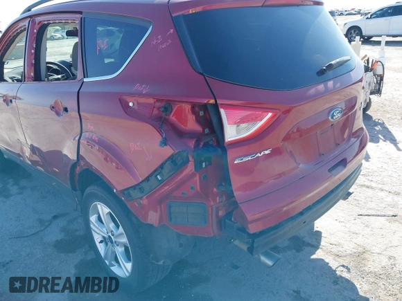 2016 Ford Escape SE with VIN 1FMCU0GX9GUB70800, listed as a IAAI auction lot 41857833 with 83,573 mi miles. Bid and sale history available at carsss.com. Image 14.