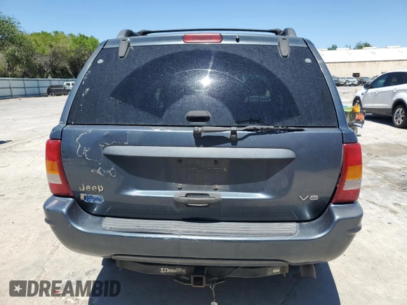 2004 Jeep Grand Cherokee Laredo z VIN 1J4GX48N54C371073, wystawiony jako Copart lot #52202855 z przebiegiem 212 368 mil mil oraz Szkoda całkowita • Salvage title. Historia ofert i sprzedaży dostępna na DreamBid. Obrazek 6.