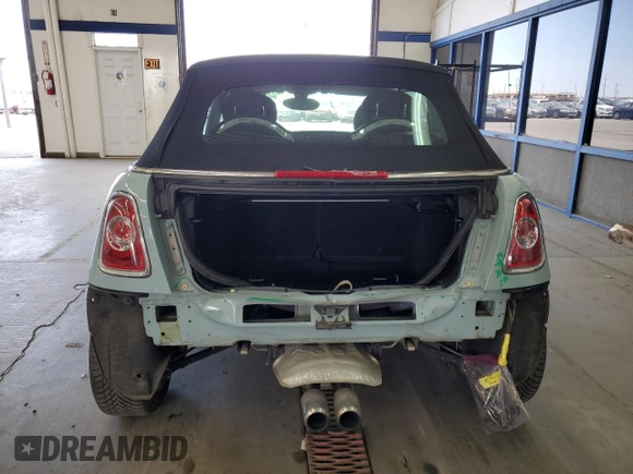 2012 MINI Convertible S с VIN WMWZP3C55CT249664, выставлен на аукционе Copart как лот 63120145 с пробегом 59 197 миль миль и Списание • Salvage title. История ставок и продаж доступна на DreamBid. Изображение 6.
