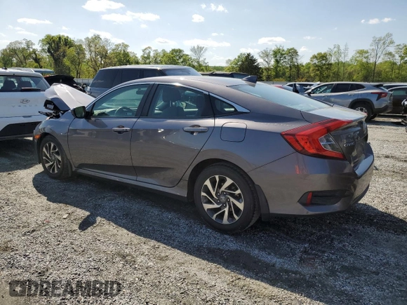 2018 Honda Civic EX with VIN 19XFC2F76JE027598, listed as a Copart auction lot 52301385 with 128,854 mi miles and Salvage Title. Bid and sale history available at DreamBid. Image 2.