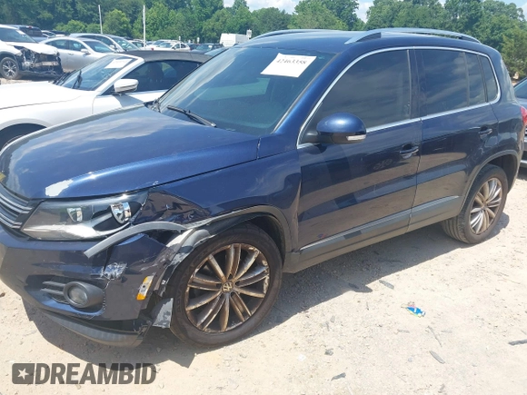 2012 Volkswagen Tiguan SE with VIN WVGAV7AX7CW534703, listed as a IAAI auction lot 42463358 with 119,699 mi miles and . Bid and sale history available at DreamBid. Image 17.